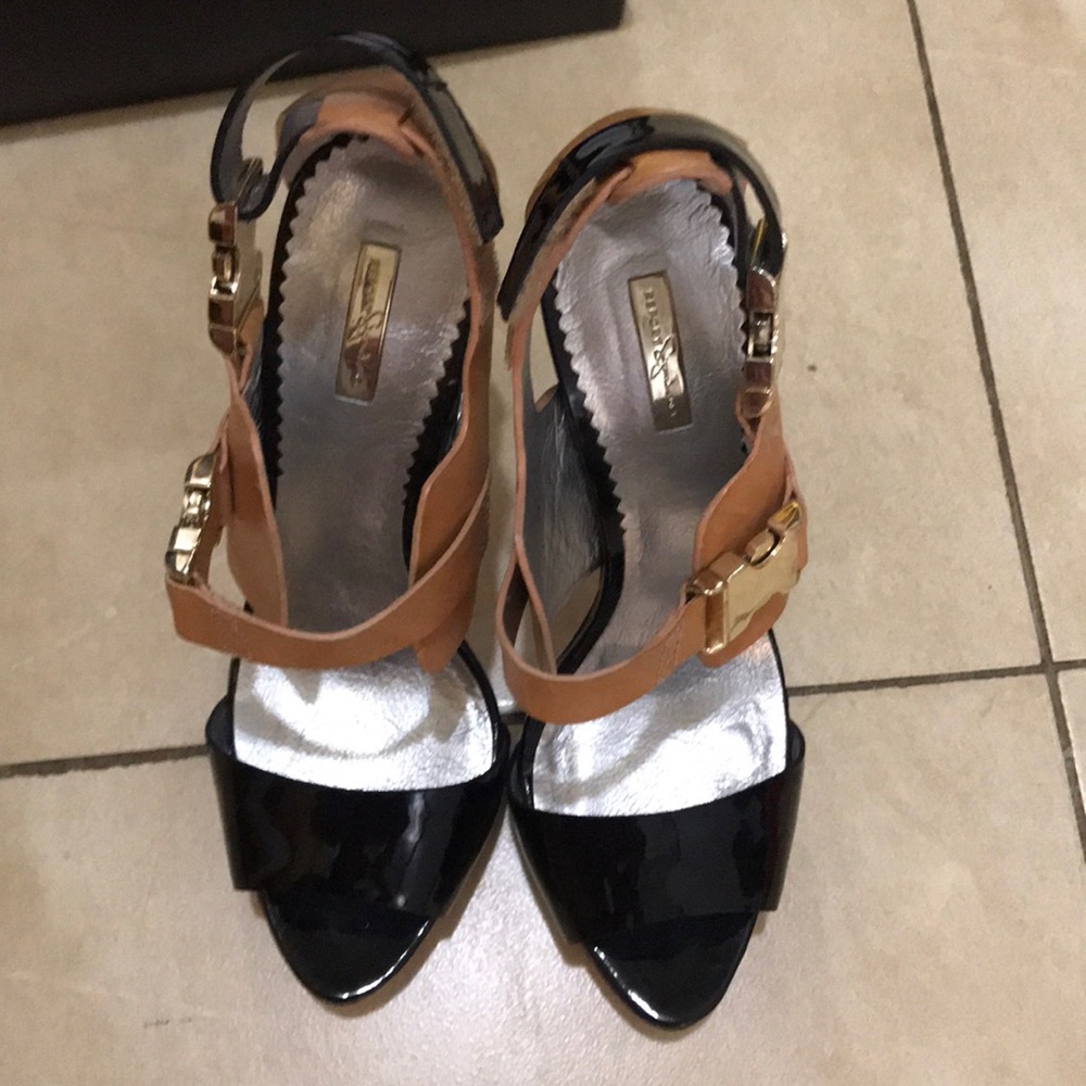 Report signature heels.